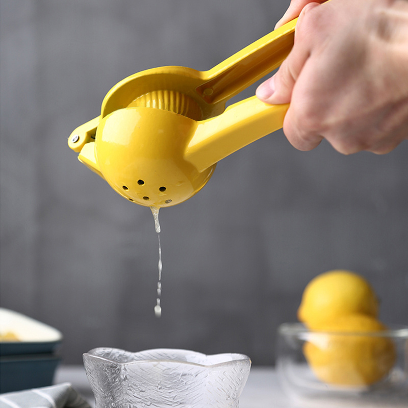 عصارة يدوية معدنية ليمون عصارة - مراجعة Kitchen Gadgets Juicer وسعره